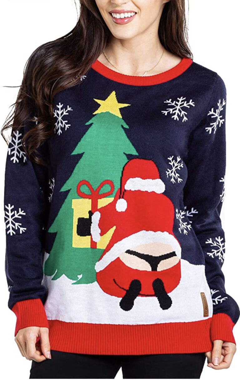 Woman rocks a navy sweater with snowflakes, red cuffs, and Santa mooning us—party’s hottest eyesore. White elephant win!.