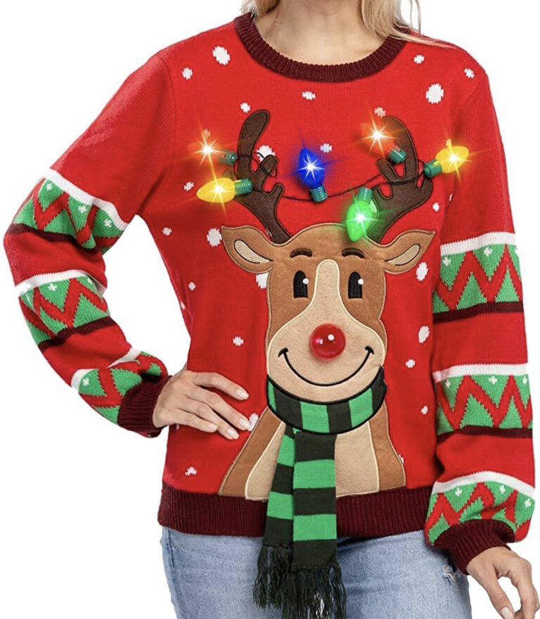 Rocking the Women’s LED Light Up Sweater: reindeer grinning, antlers flashing, scarf blindingly green—holiday chaos level: expert.