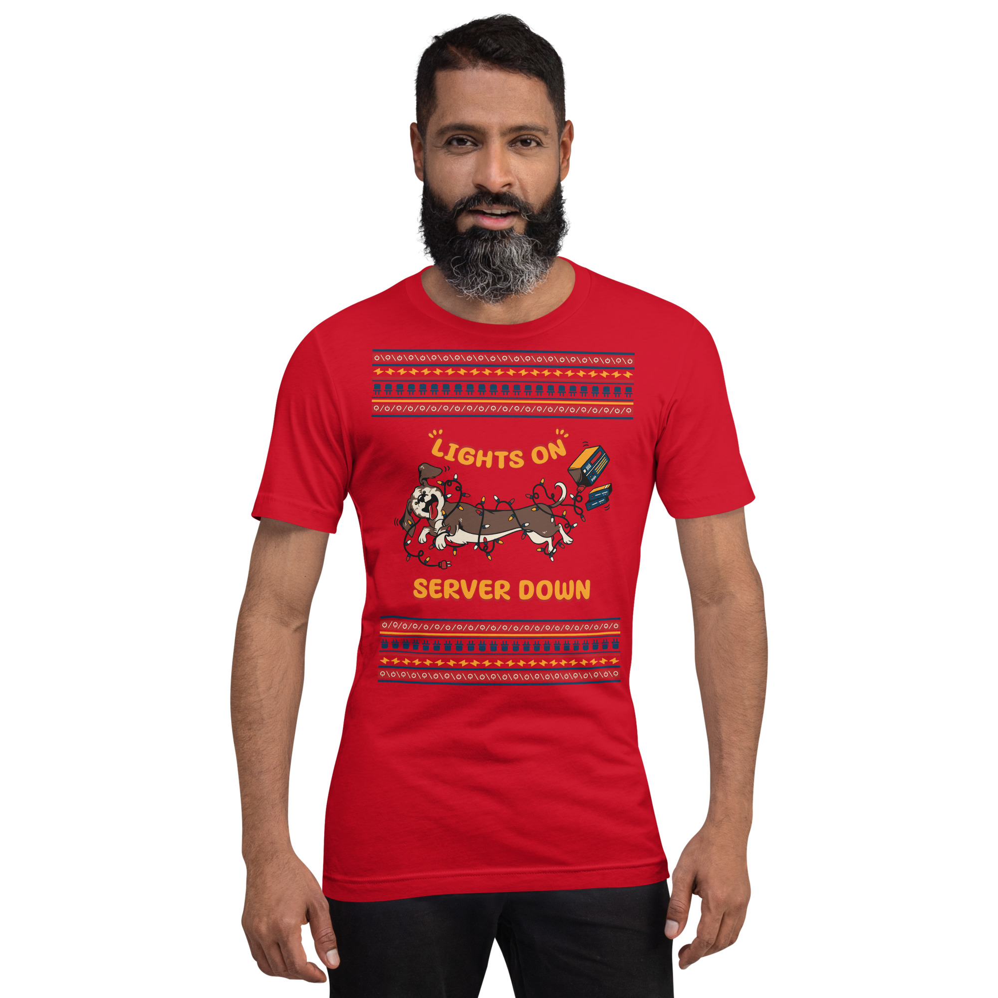 Bearded guy rocks a wild red tee with cartoon dogs in Christmas light chaos and “Lights On, Server Down” sass like party royalty.