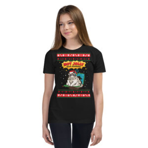 A young woman rocks a black tee with a grumpy pug in a Santa hat, moaning “NOT JOLLY, MOOD: SUFFERING”—holiday spirit, upgraded!.