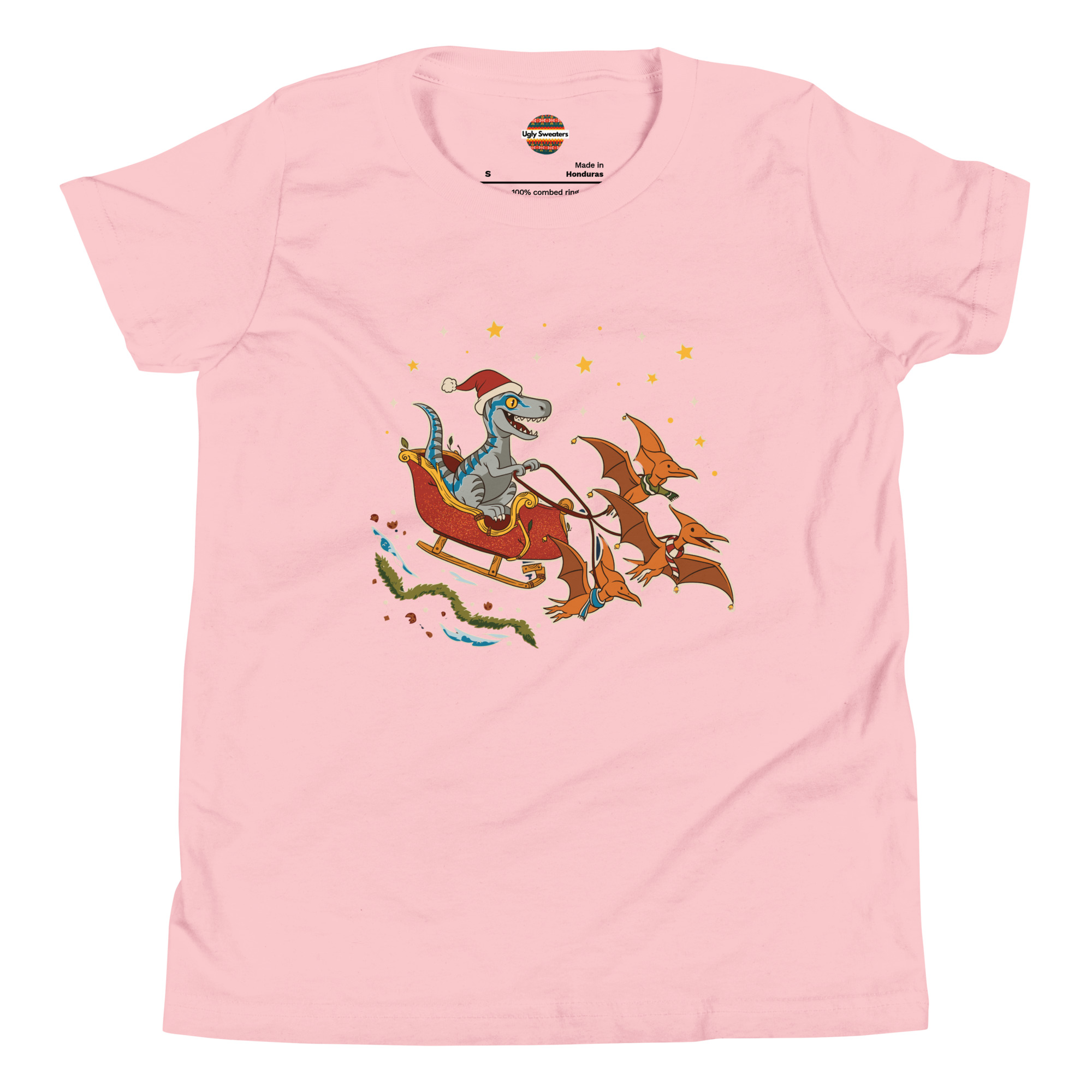 Pink T-shirt with a T. rex in a Santa hat hitching a ride on a pterodactyl sleigh—because dinosaurs do Christmas better.
