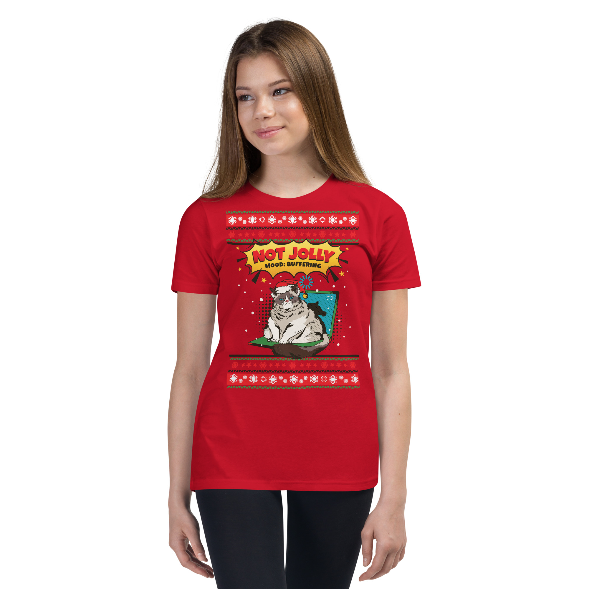 A girl with long brown hair rocks a red tee flaunting a cranky cat in a Santa hat, “Not Jolly, Mood: Suffering,” plus wild snowflakes.