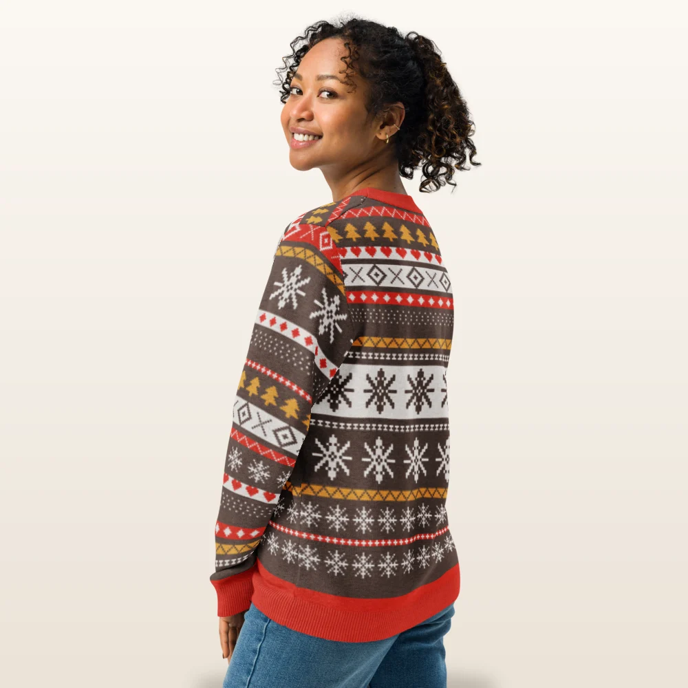 Woman wearing the Moose Shetland knitted Christmas sweater, back view with the star medallion band